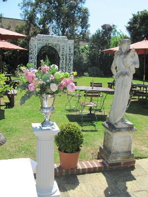 Silver urn with summer flowers