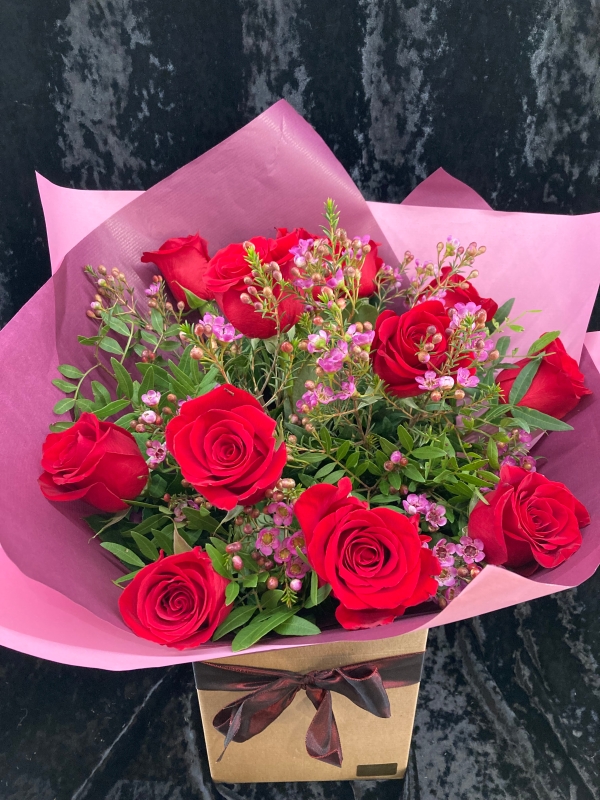 Romantic 12 Red Rose Hand Tied