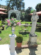 Silver urn with summer flowers